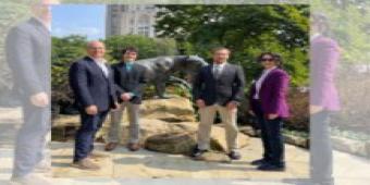 photo of Dr. Robert Cunningham, Dr. Mai Abdelhakim, Quincy Bayer, and Dr. Robert Esswein 